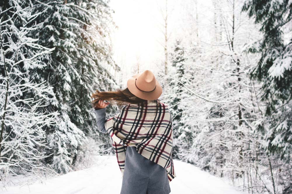 walking in snow filled forest