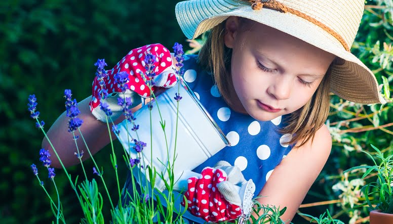 little girl gardening